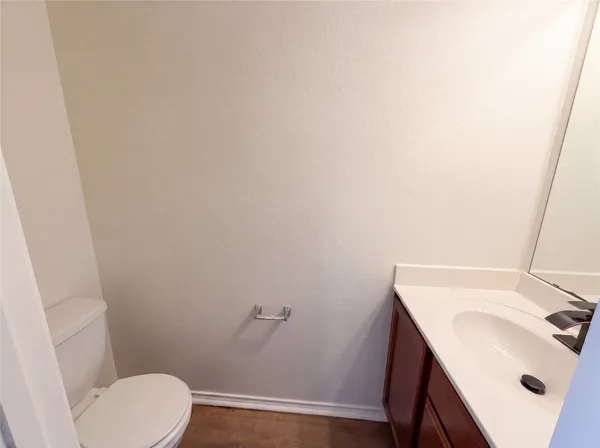a bathroom with a sink and a toilet