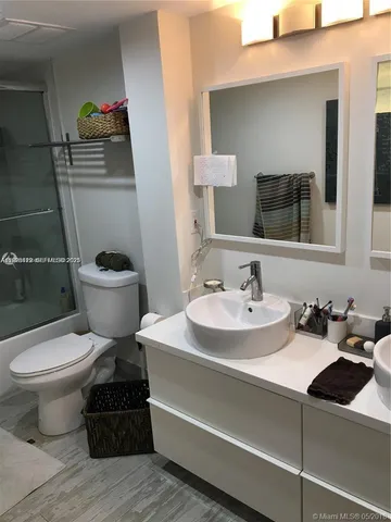 a bathroom with a sink and a toilet