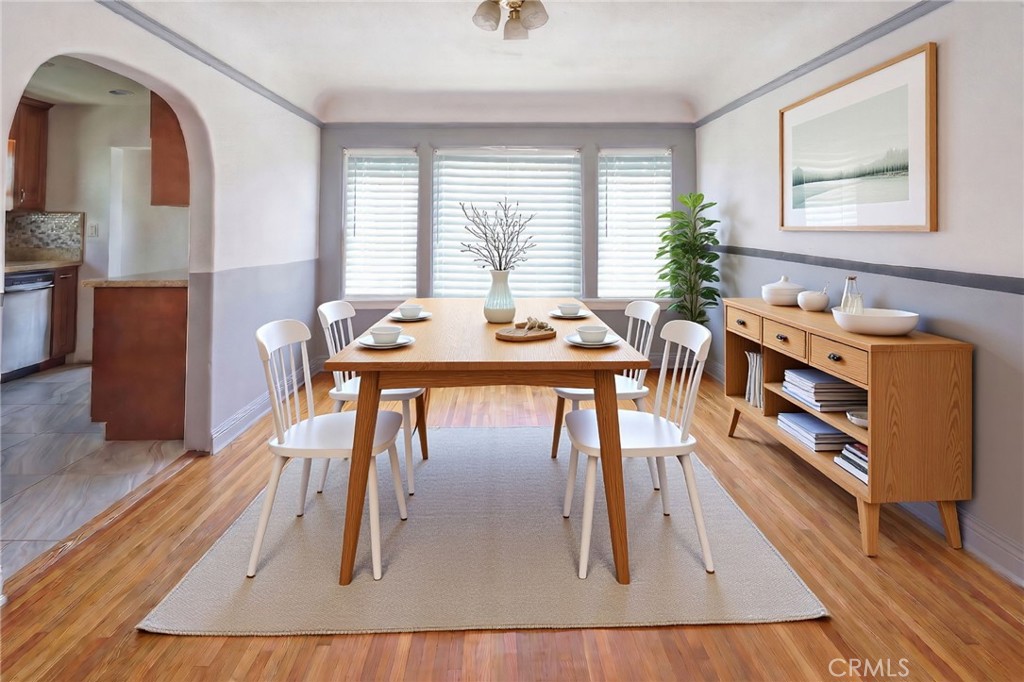 346 West School Street Compton, CA 90220 - Photo 11 of 29 a view of a dining room with furniture window and wooden floor
