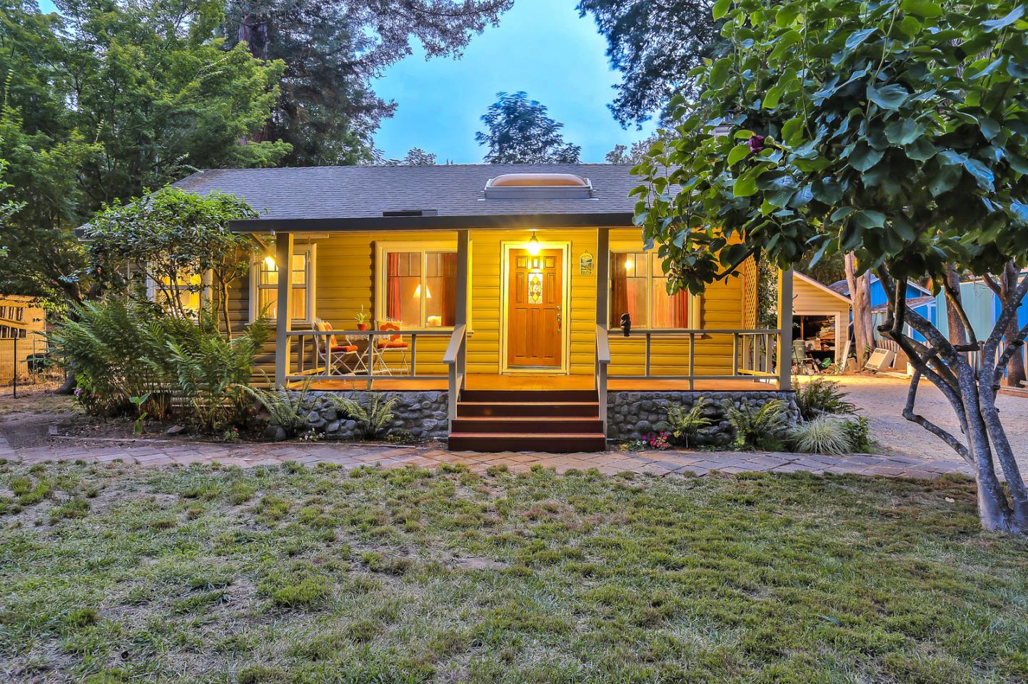 300 Riverside Avenue Ben Lomond, CA 95005 - Photo 2 of 22 a view of house with garden and trees