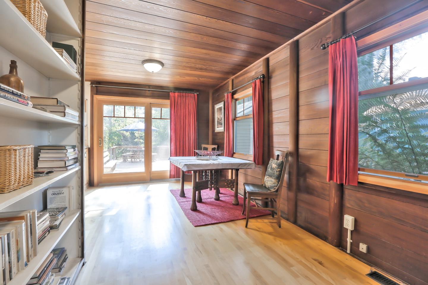 300 Riverside Avenue Ben Lomond, CA 95005 - Photo 7 of 22 a view of a livingroom with furniture a fireplace and wooden floor