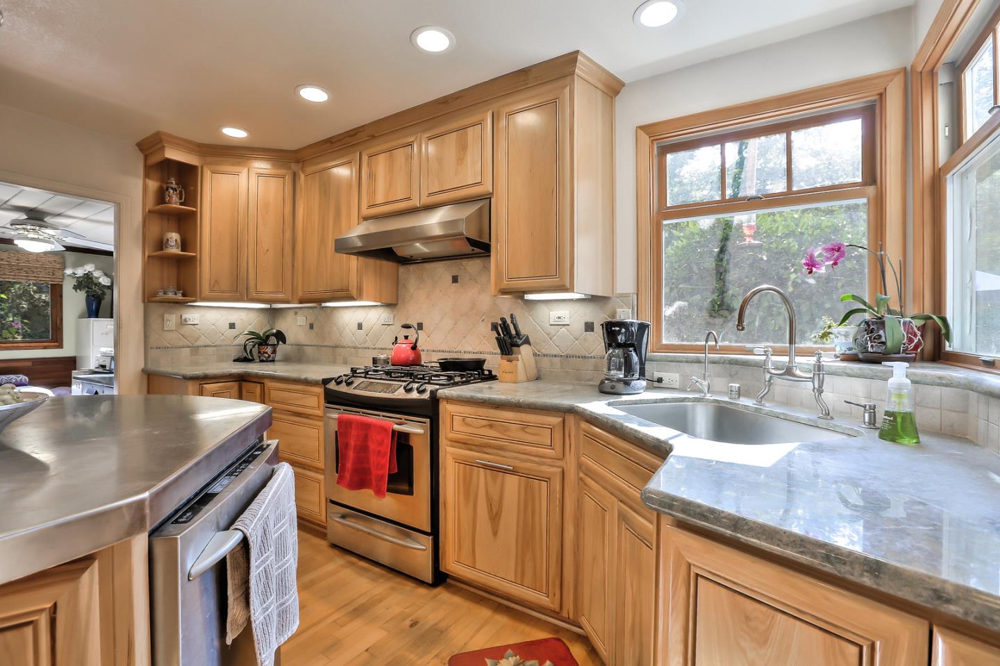 300 Riverside Avenue Ben Lomond, CA 95005 - Photo 9 of 22 a kitchen with stainless steel appliances granite countertop a sink stove and refrigerator