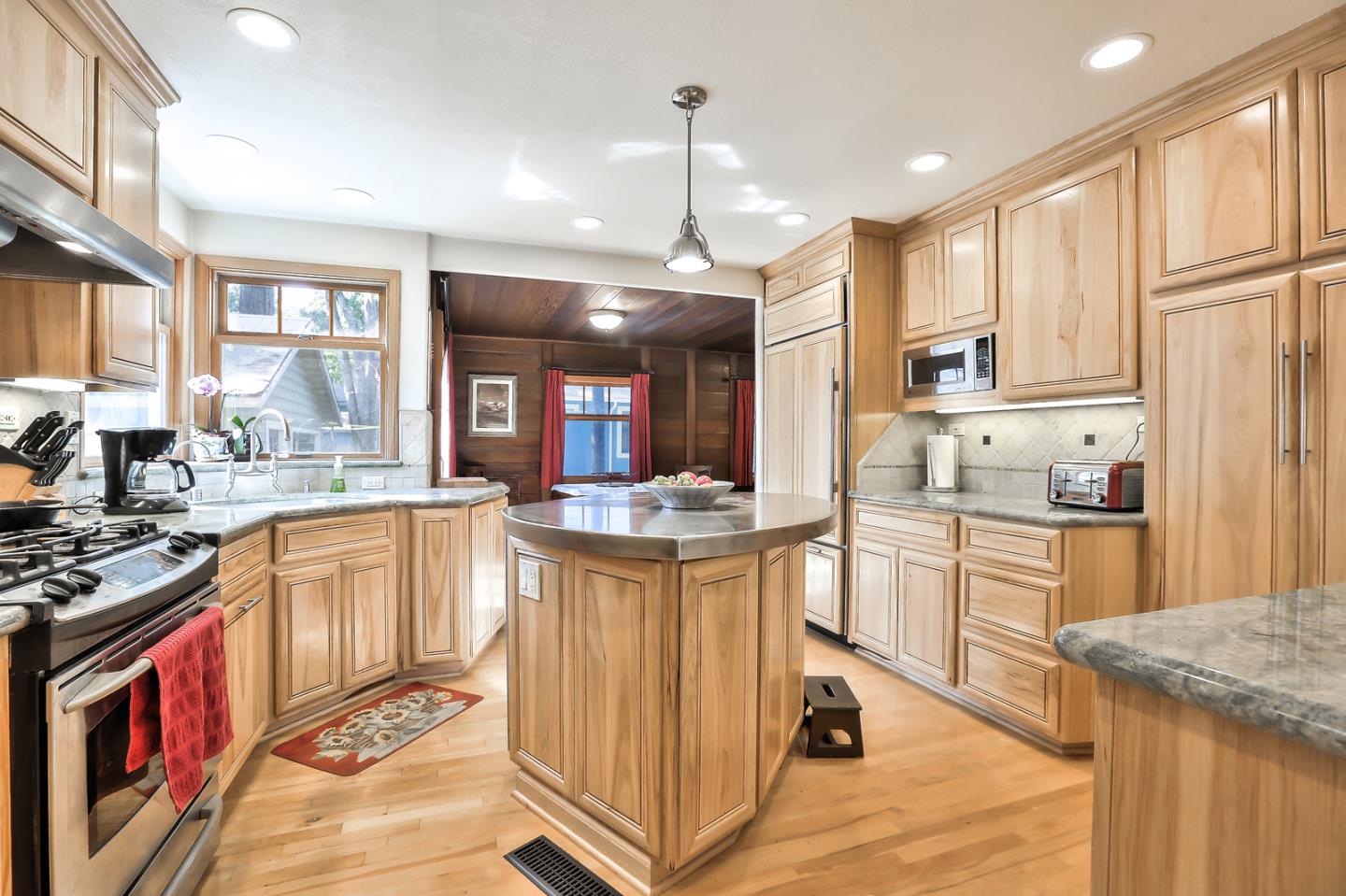 300 Riverside Avenue Ben Lomond, CA 95005 - Photo 10 of 22 a kitchen with stainless steel appliances granite countertop a stove a sink dishwasher a refrigerator and white cabinets with wooden floor