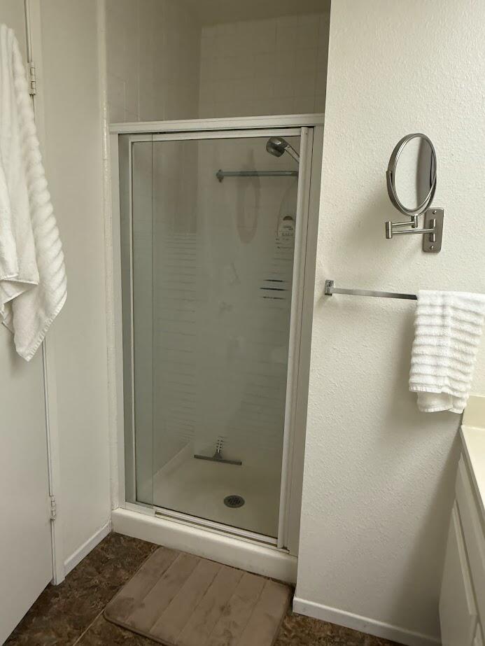 72822 Tony Trabert Lane Palm Desert, CA 92260 - Photo 19 of 23 a bathroom with a shower