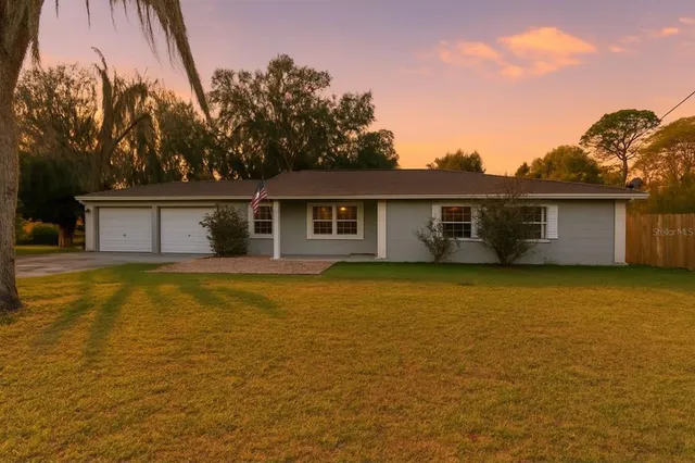 a front view of a house with swimming pool