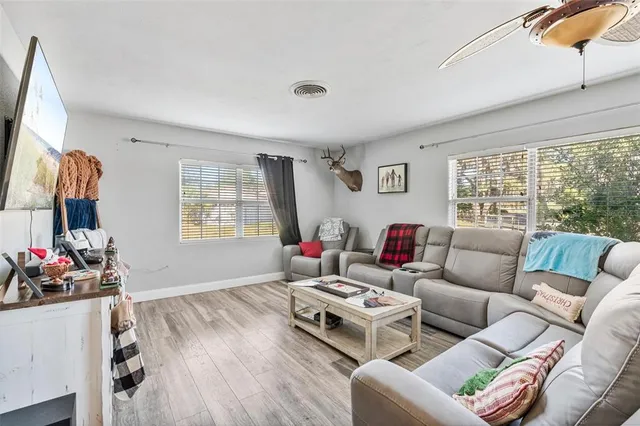 a living room with furniture and a window