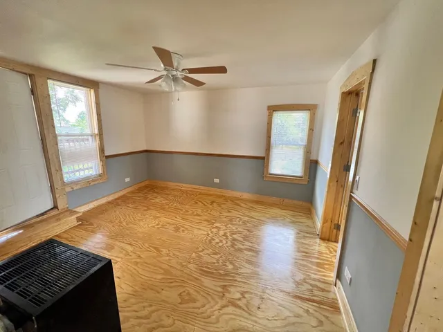 a view of an empty room and window