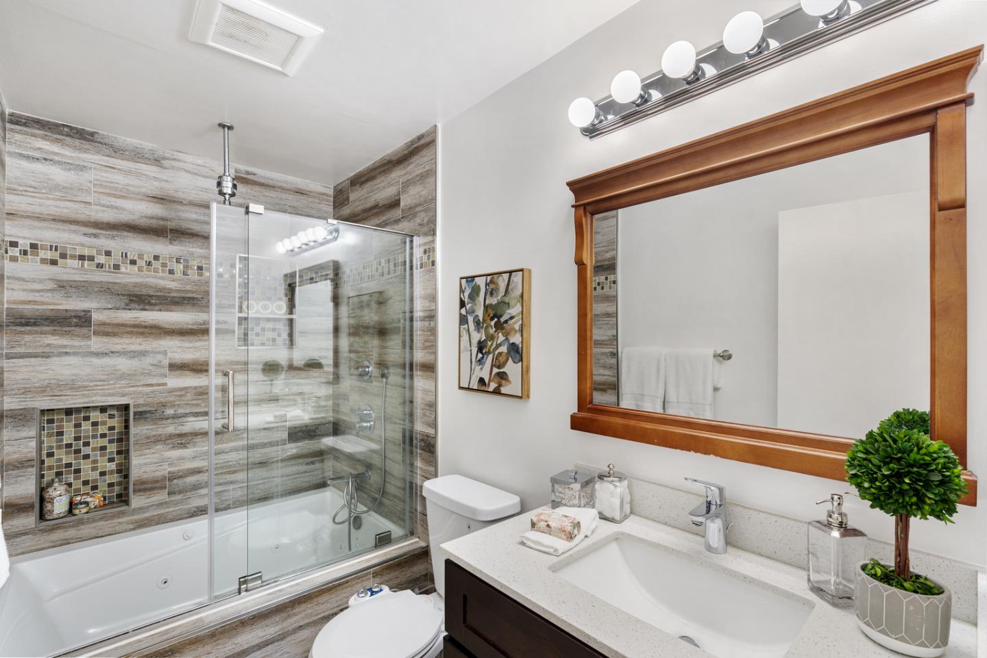 5601 Drysdale Drive San Jose, CA 95124 - Photo 14 of 26 a bathroom with a sink and a mirror