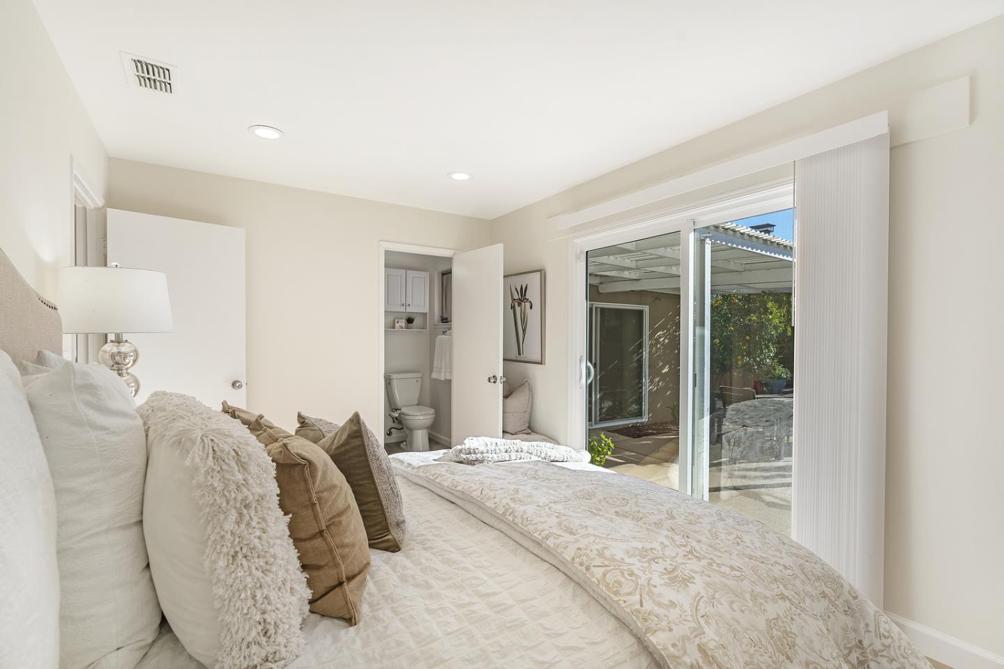 5601 Drysdale Drive San Jose, CA 95124 - Photo 16 of 26 a bed room with a bed and a large window