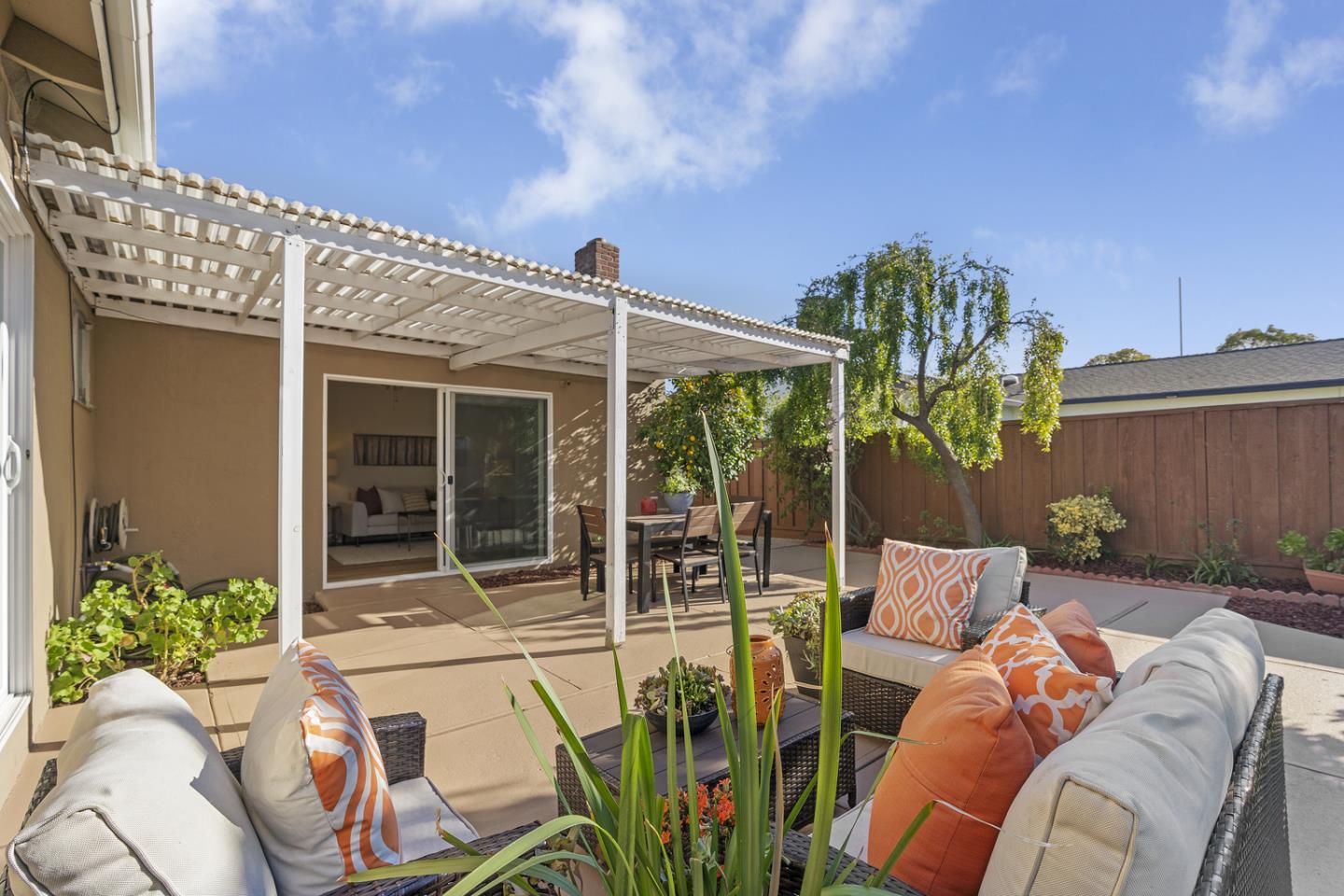 5601 Drysdale Drive San Jose, CA 95124 - Photo 20 of 26 a view of a patio with couches table and chairs and potted plants