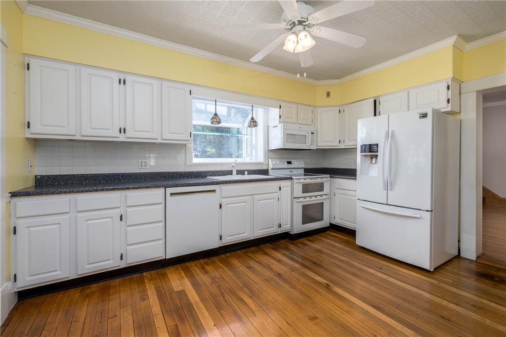 1741 Ridgewood Drive Washington, PA 15301 - Photo 22 of 45 14'4" X 11'5" FULLY EQUIPPED KITCHEN WITH WINDOW BOX AND SO MUCH NATURAL LIGHT.