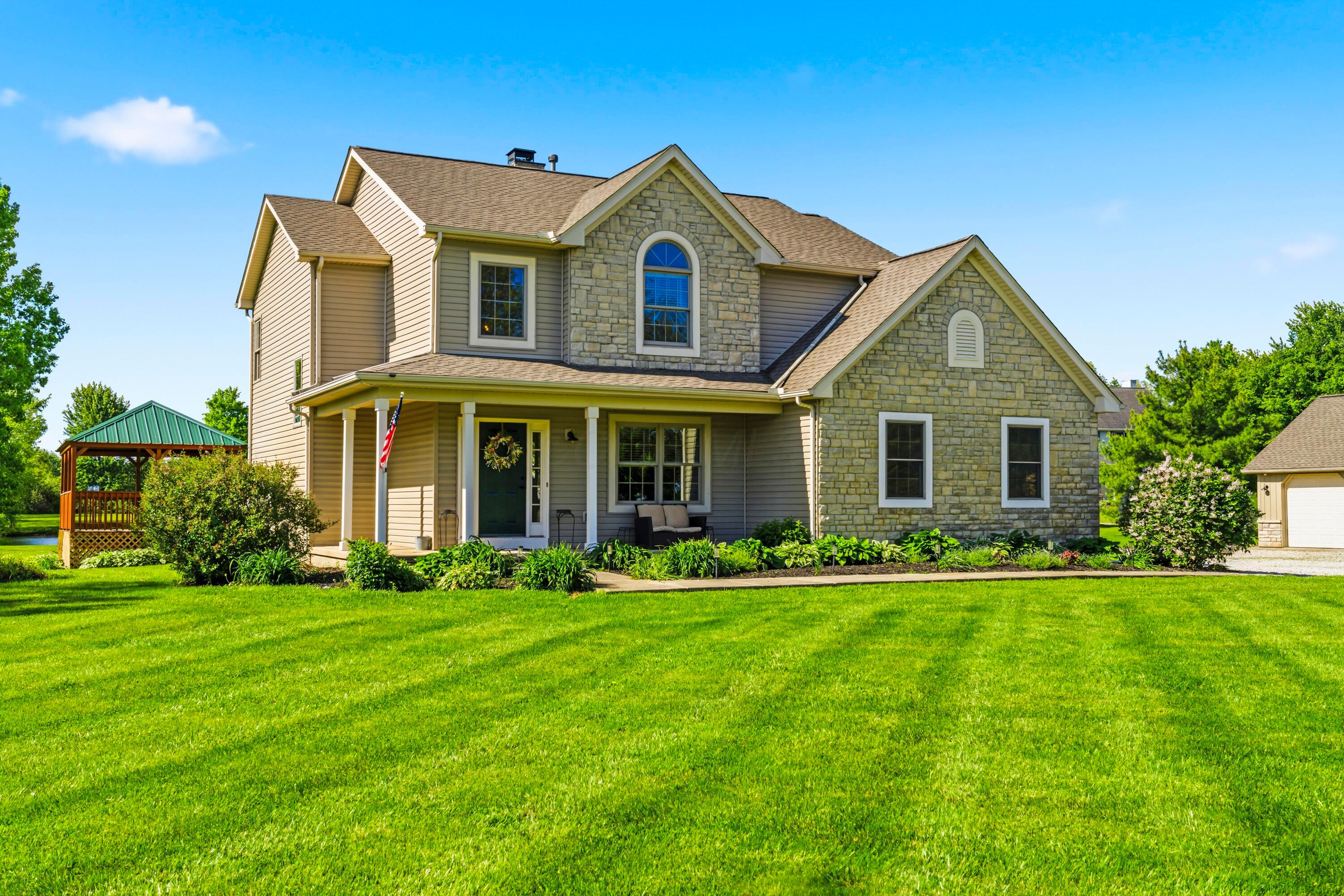 8507 Benner Road Johnstown, OH 43031 - Photo 1 of 69 Welcome to our NEWEST Johnstown listing, situated on 3.74 acres! This traditional two story with covered front porch offers 4 bedrooms, 3 full baths and over 2,930 sqft