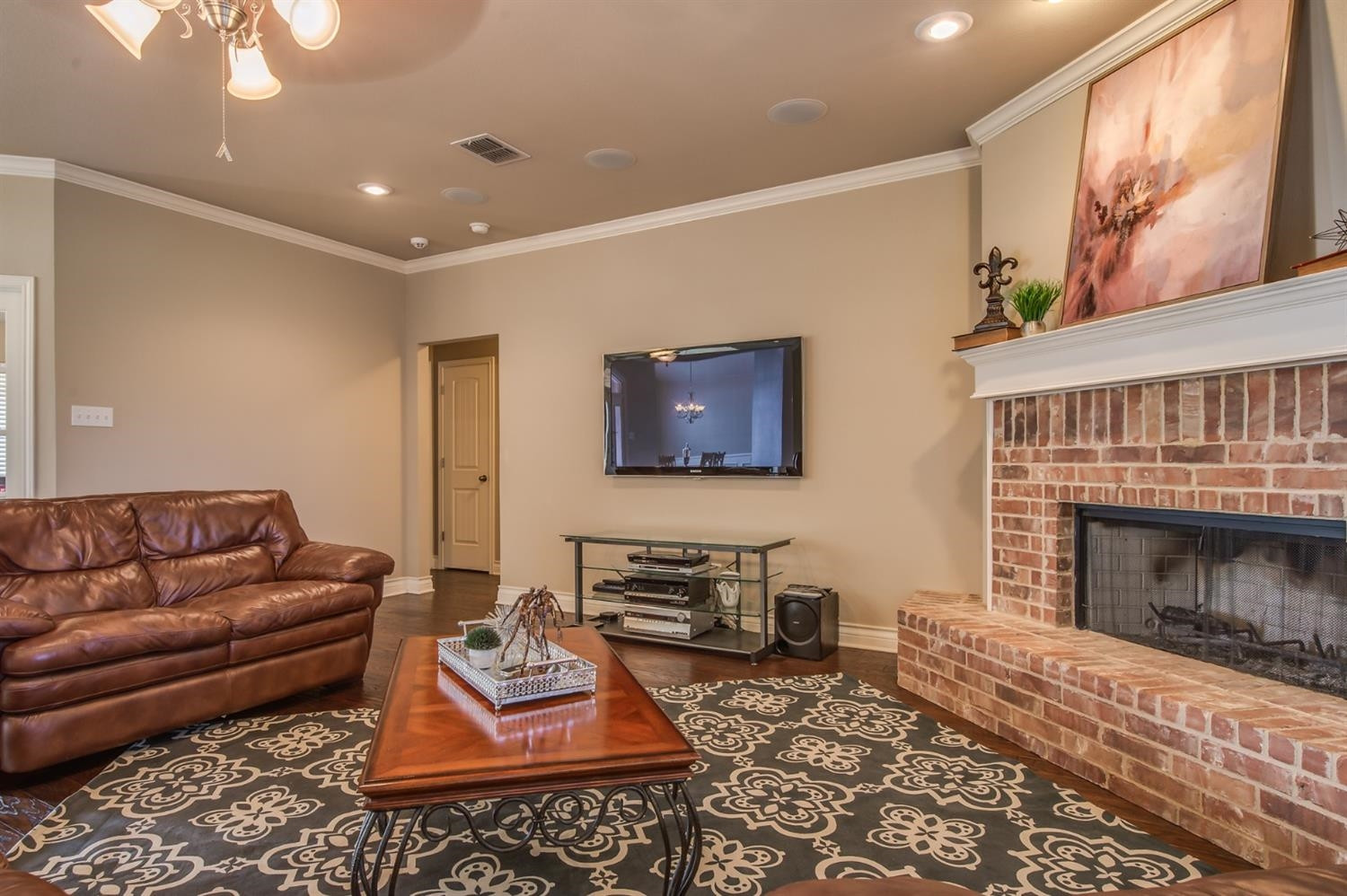 1921 Mesa Road Lubbock, TX 79403 - Photo 8 of 10 a living room with furniture and a fireplace