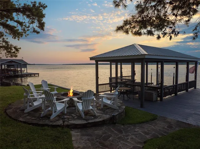 a view of a swimming pool with chairs