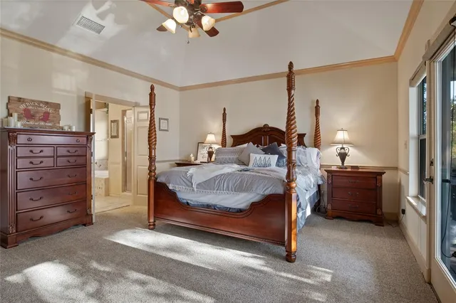 a bed room with a bed and a dresser