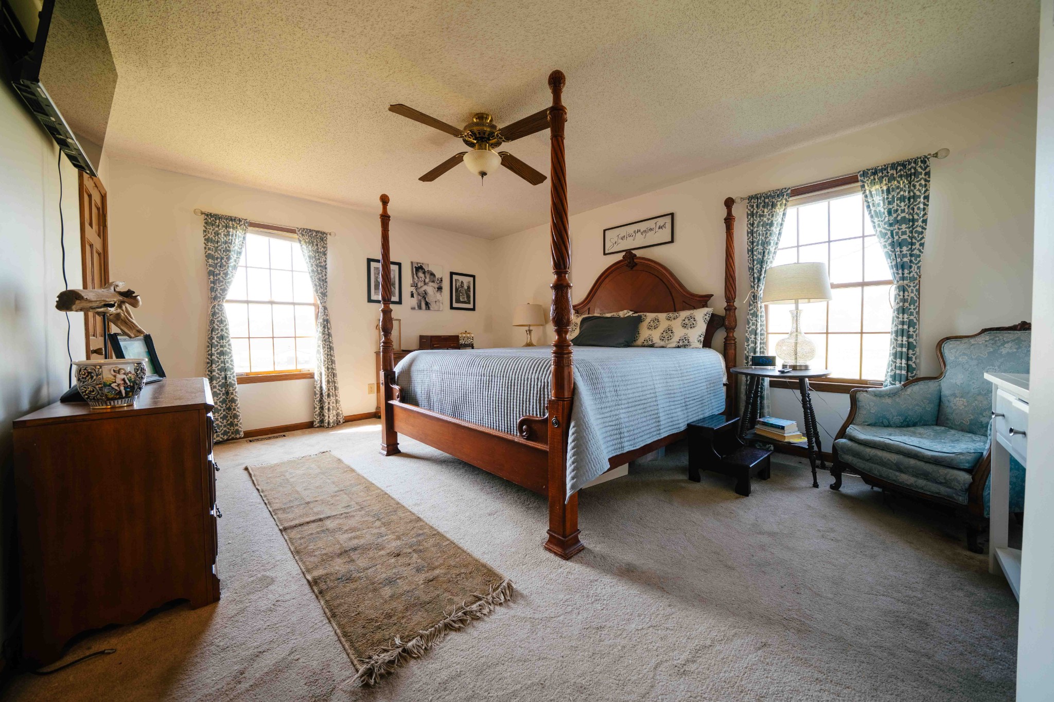 194 Al Roman Road Pulaski, TN 38478 - Photo 2 of 15 a bedroom with a bed and a dresser next to a window