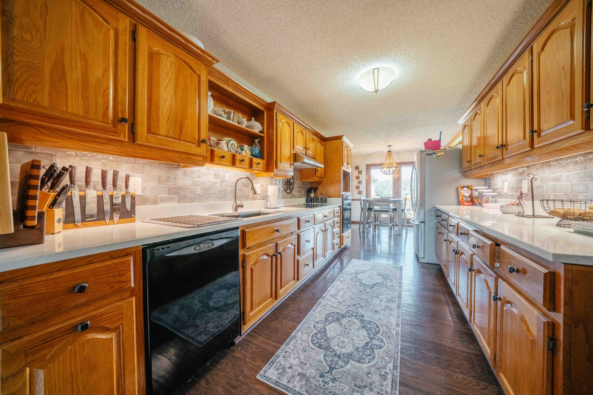 194 Al Roman Road Pulaski, TN 38478 - Photo 7 of 15 a kitchen with stainless steel appliances granite countertop a sink and cabinets