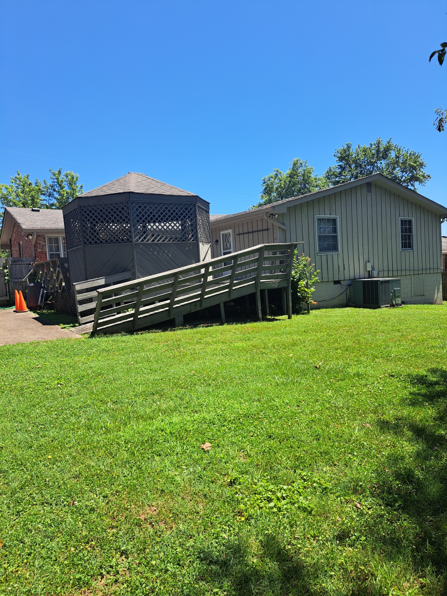8317 Gordon Lane Hermitage, TN 37076 - Photo 11 of 23 a view of a back yard with a wooden fence