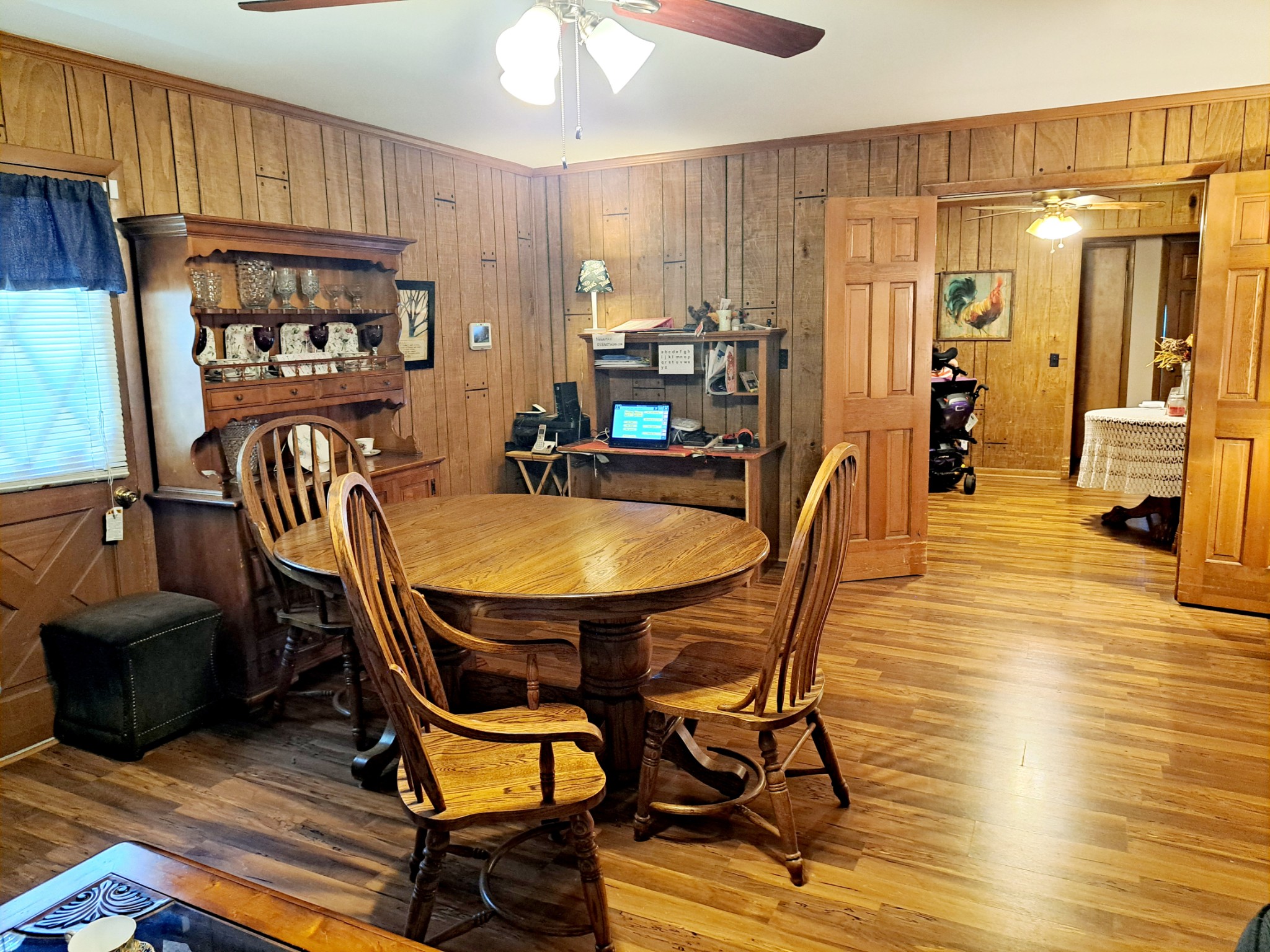 8317 Gordon Lane Hermitage, TN 37076 - Photo 13 of 23 a view of a dining room with furniture and wooden floor