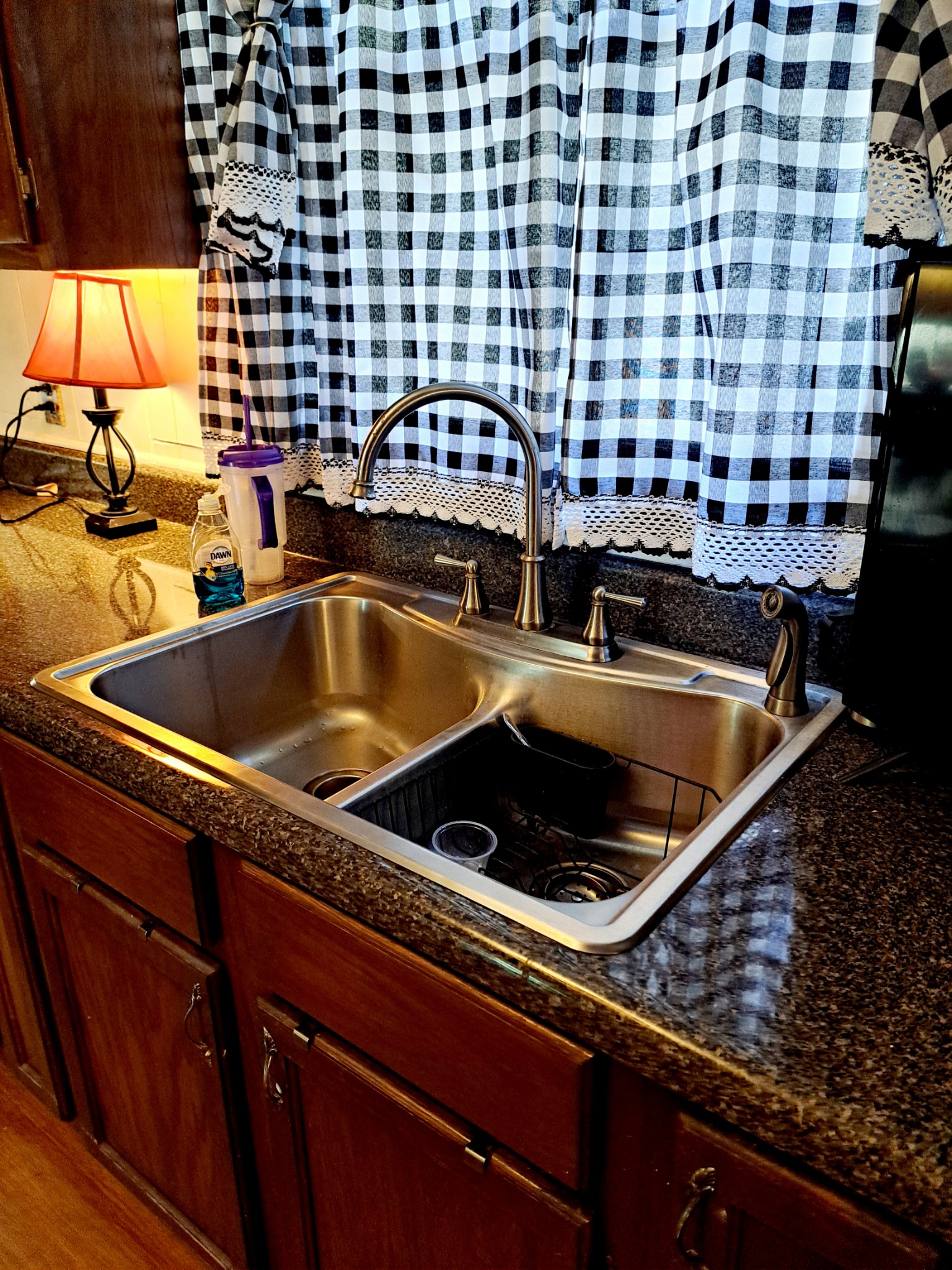 8317 Gordon Lane Hermitage, TN 37076 - Photo 18 of 23 a kitchen with a sink and cabinets