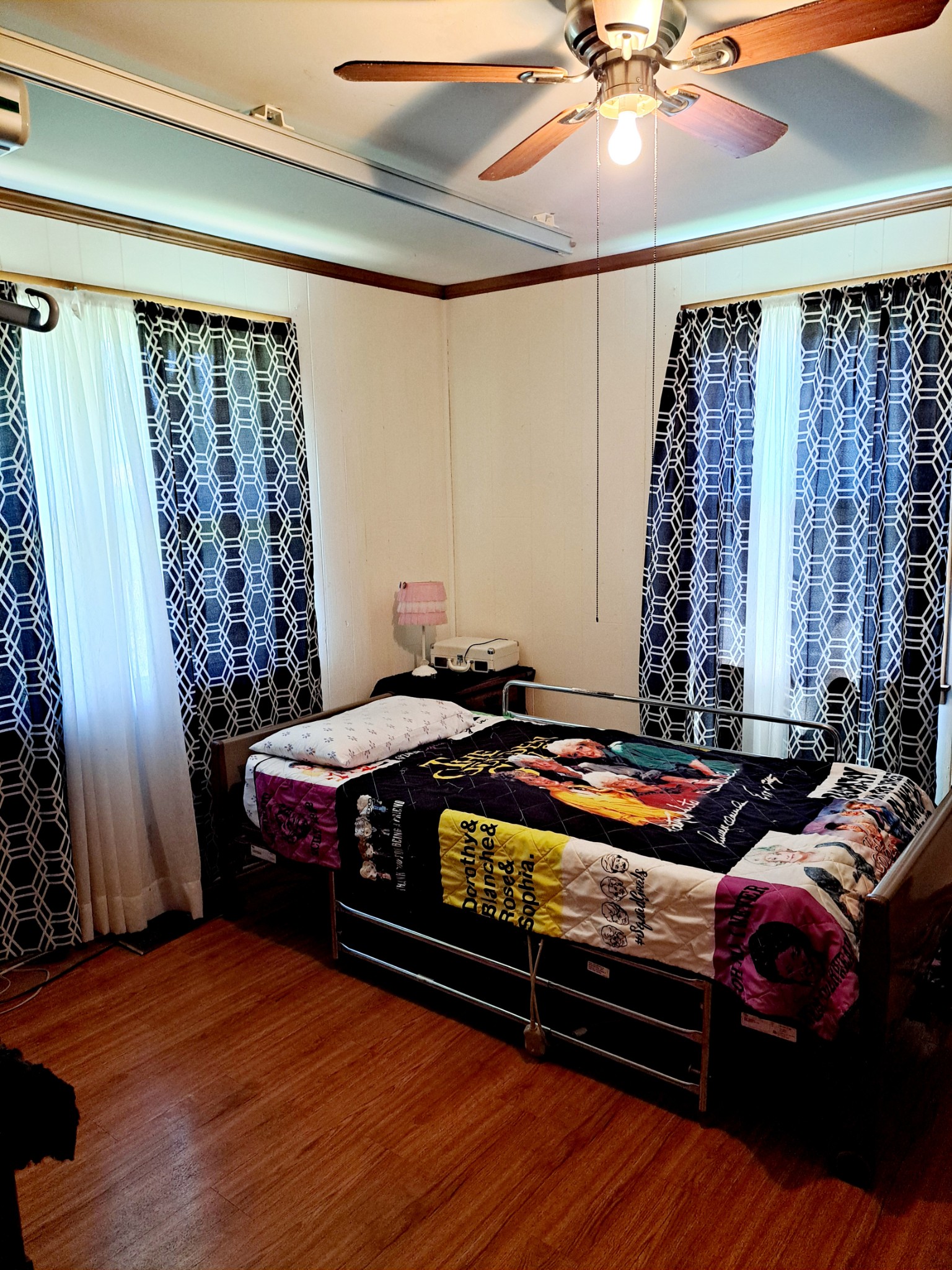 8317 Gordon Lane Hermitage, TN 37076 - Photo 22 of 23 a bedroom with a bed and a chandelier