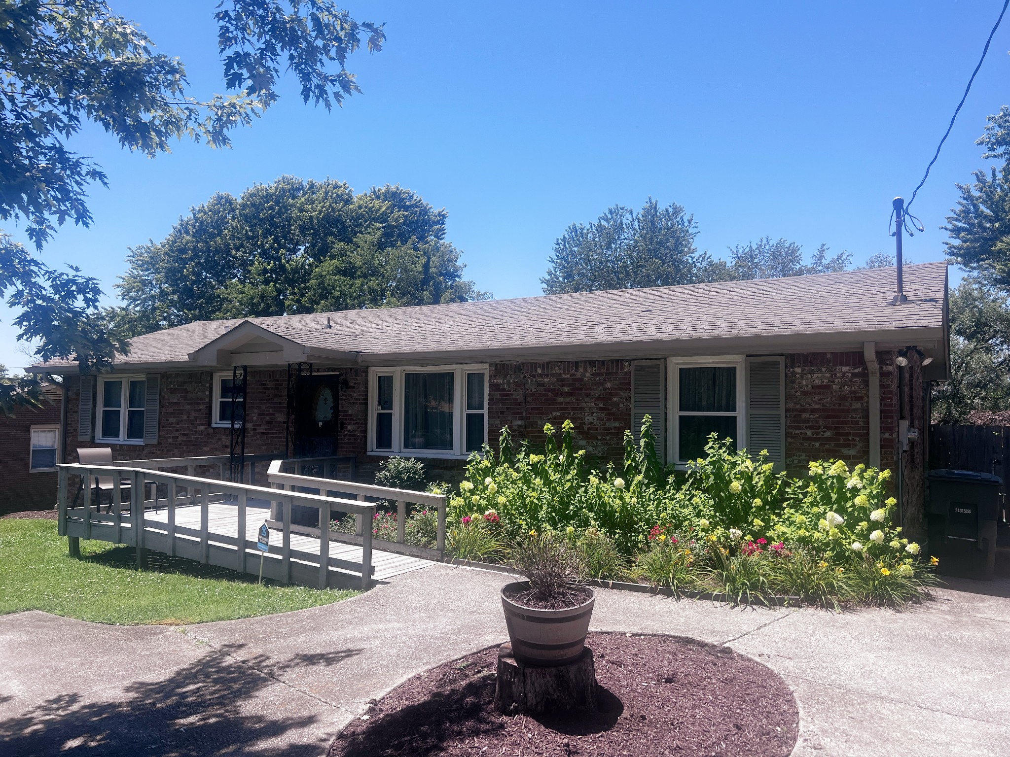 8317 Gordon Lane Hermitage, TN 37076 - Photo 3 of 23 a front view of a house with yard and green space