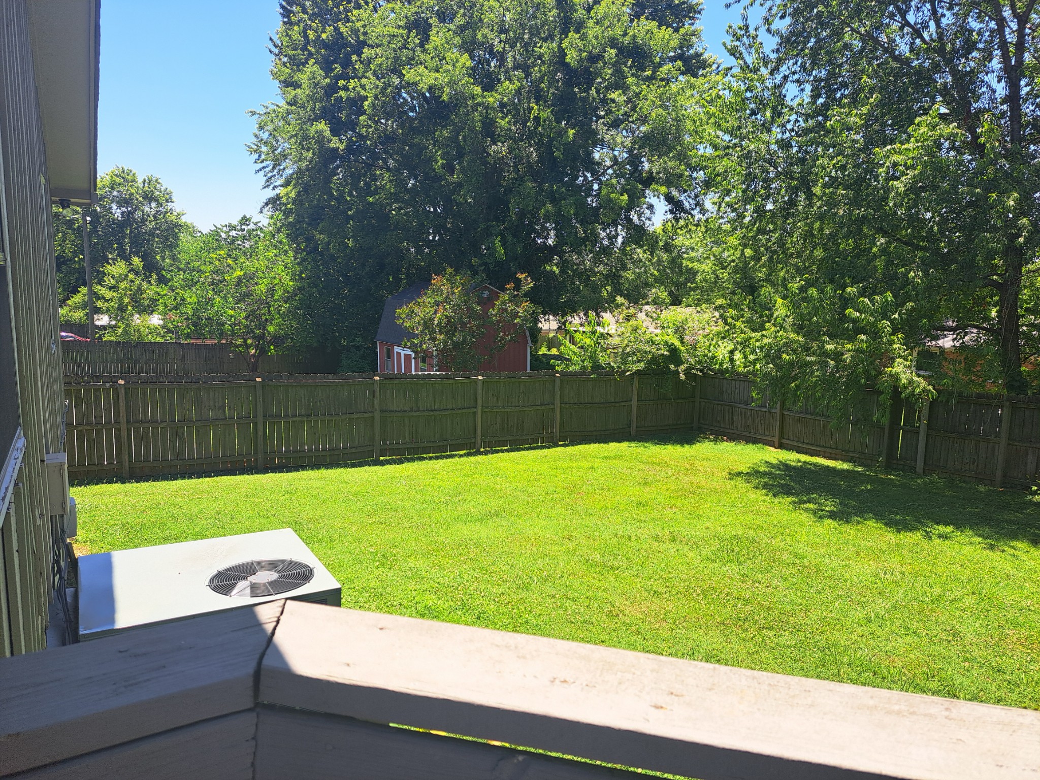 8317 Gordon Lane Hermitage, TN 37076 - Photo 6 of 23 a view of a park with a bench and trees