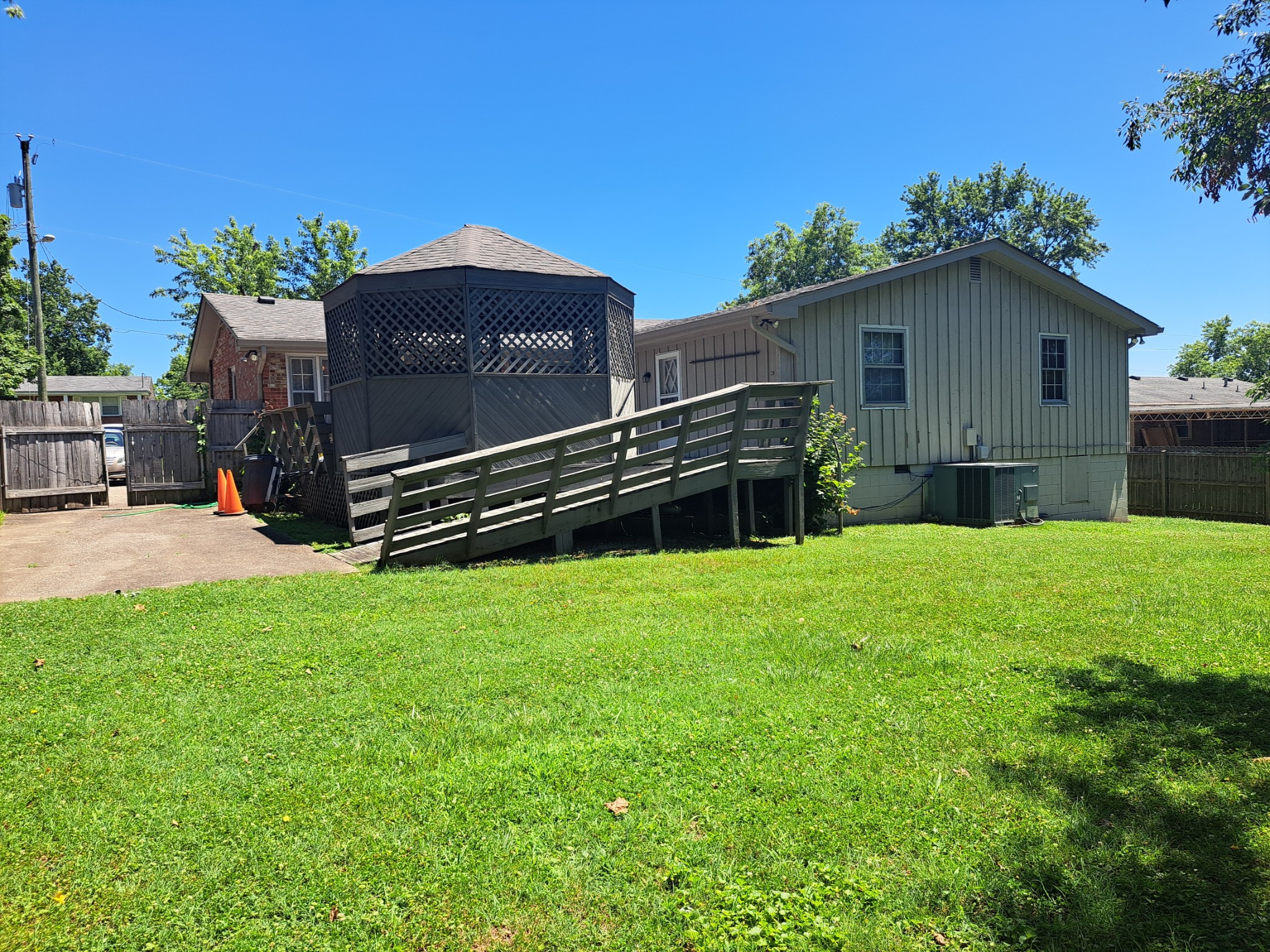 8317 Gordon Lane Hermitage, TN 37076 - Photo 9 of 23 a house view with a garden space