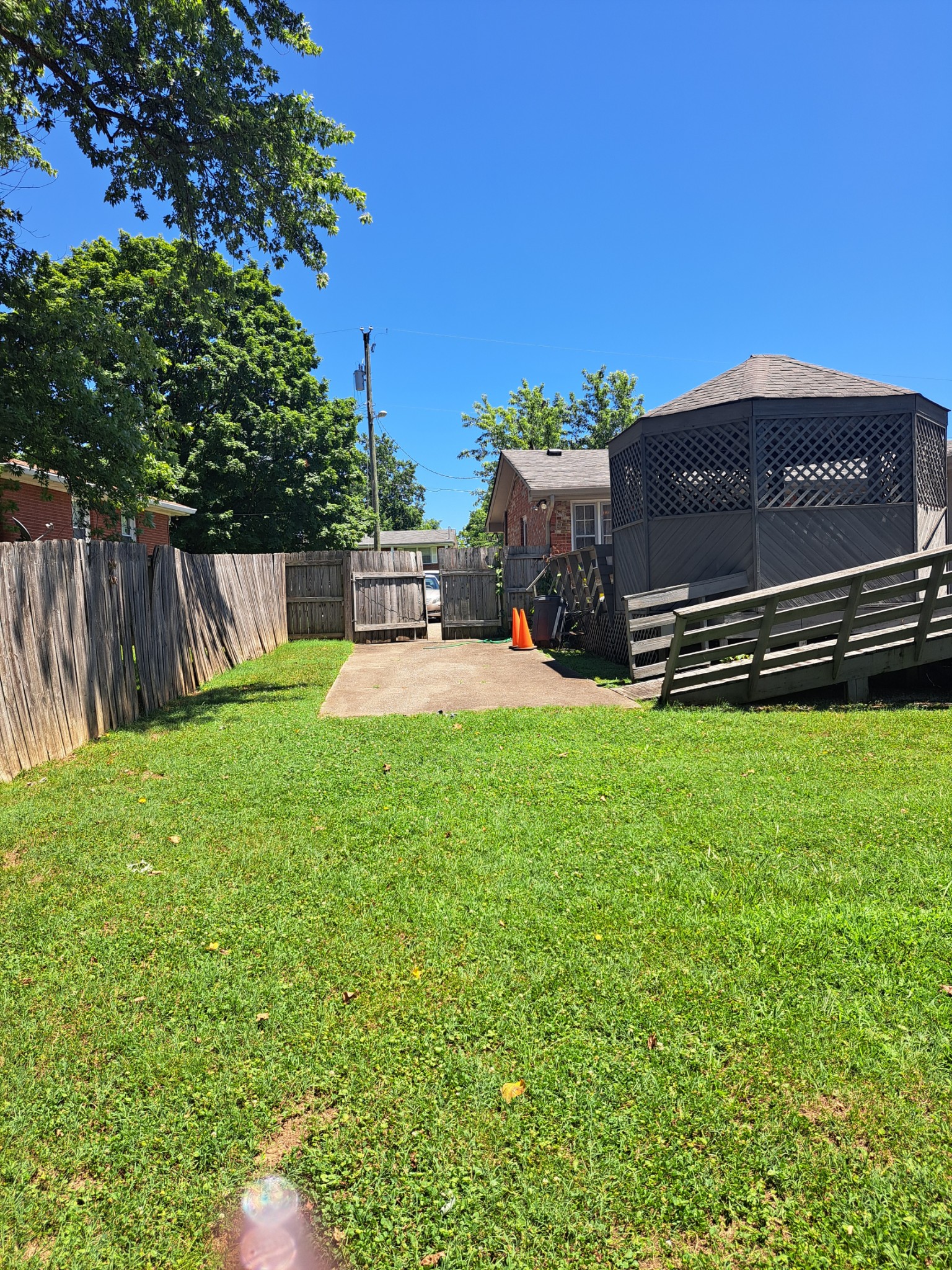 8317 Gordon Lane Hermitage, TN 37076 - Photo 10 of 23 a view of a chair and table in the garden