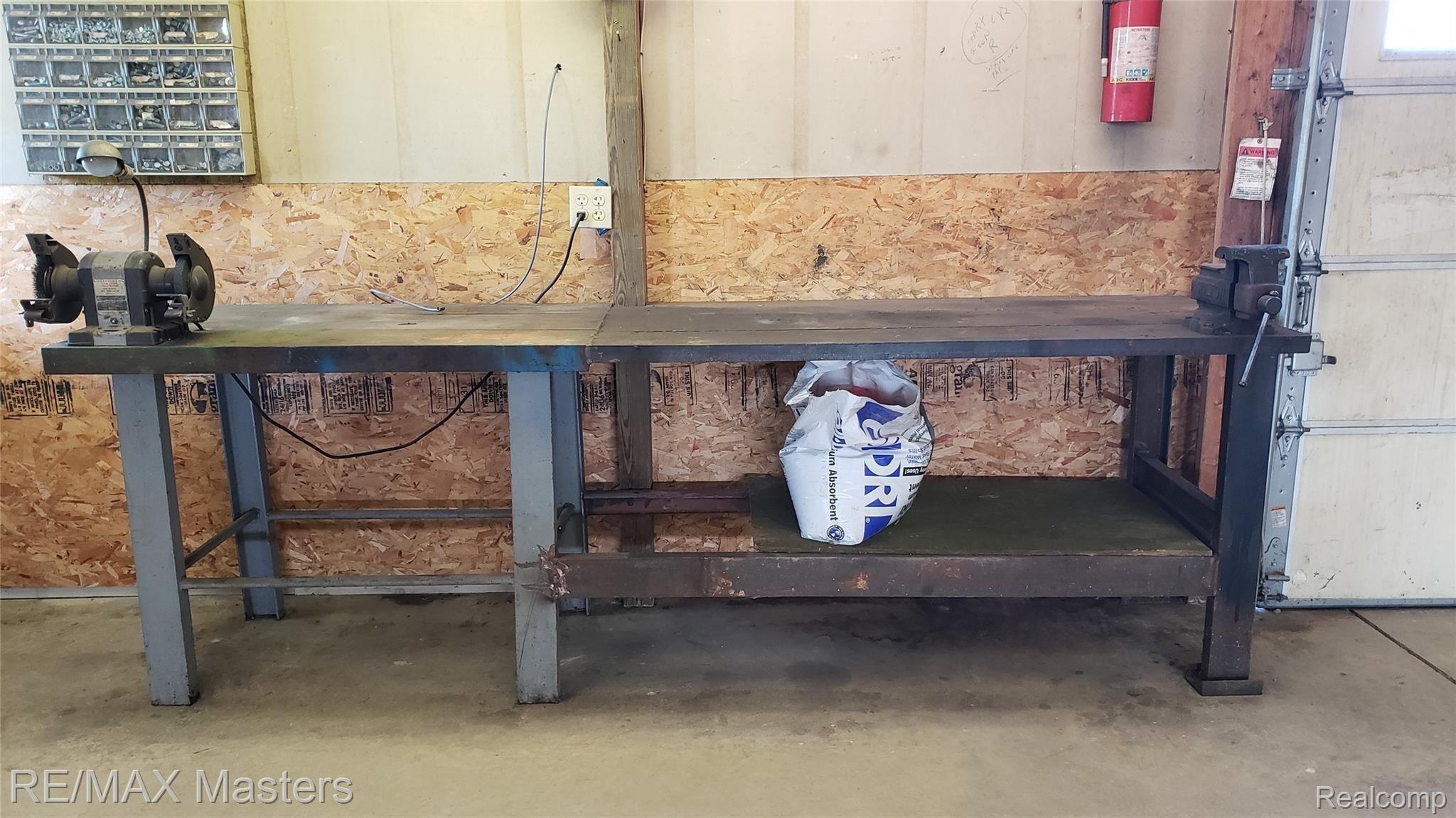 2466 Carleton West Road Carleton, MI 48117 - Photo 19 of 48 Pole Barn Work Bench