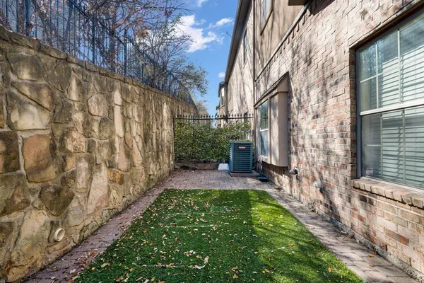 a view of yard with patio