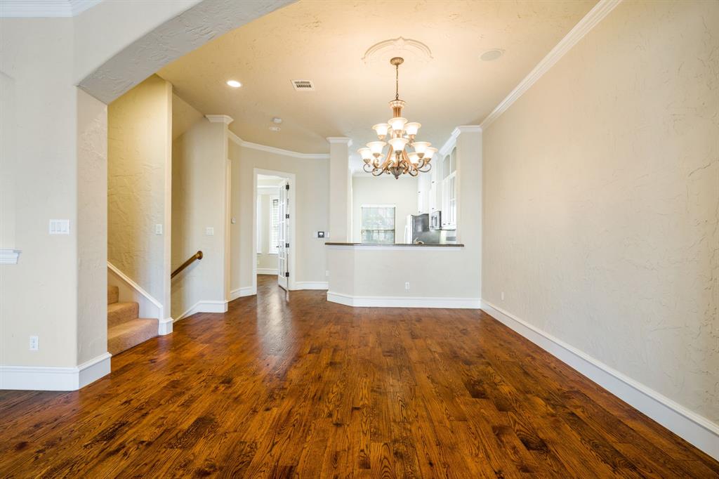 554 Rockingham Drive Irving, TX 75063 - Photo 10 of 34 a view of a livingroom with a chandelier