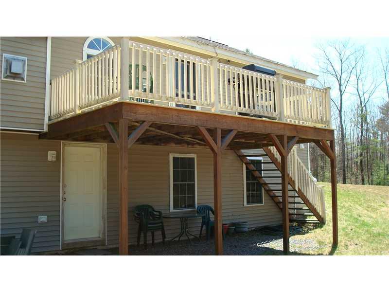 565 Bonny Eagle Road Standish, ME 04084 - Photo 5 of 24 Exterior Back. Large deck and light...