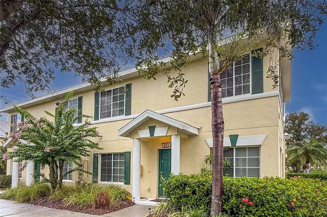 front view of a house with a garden