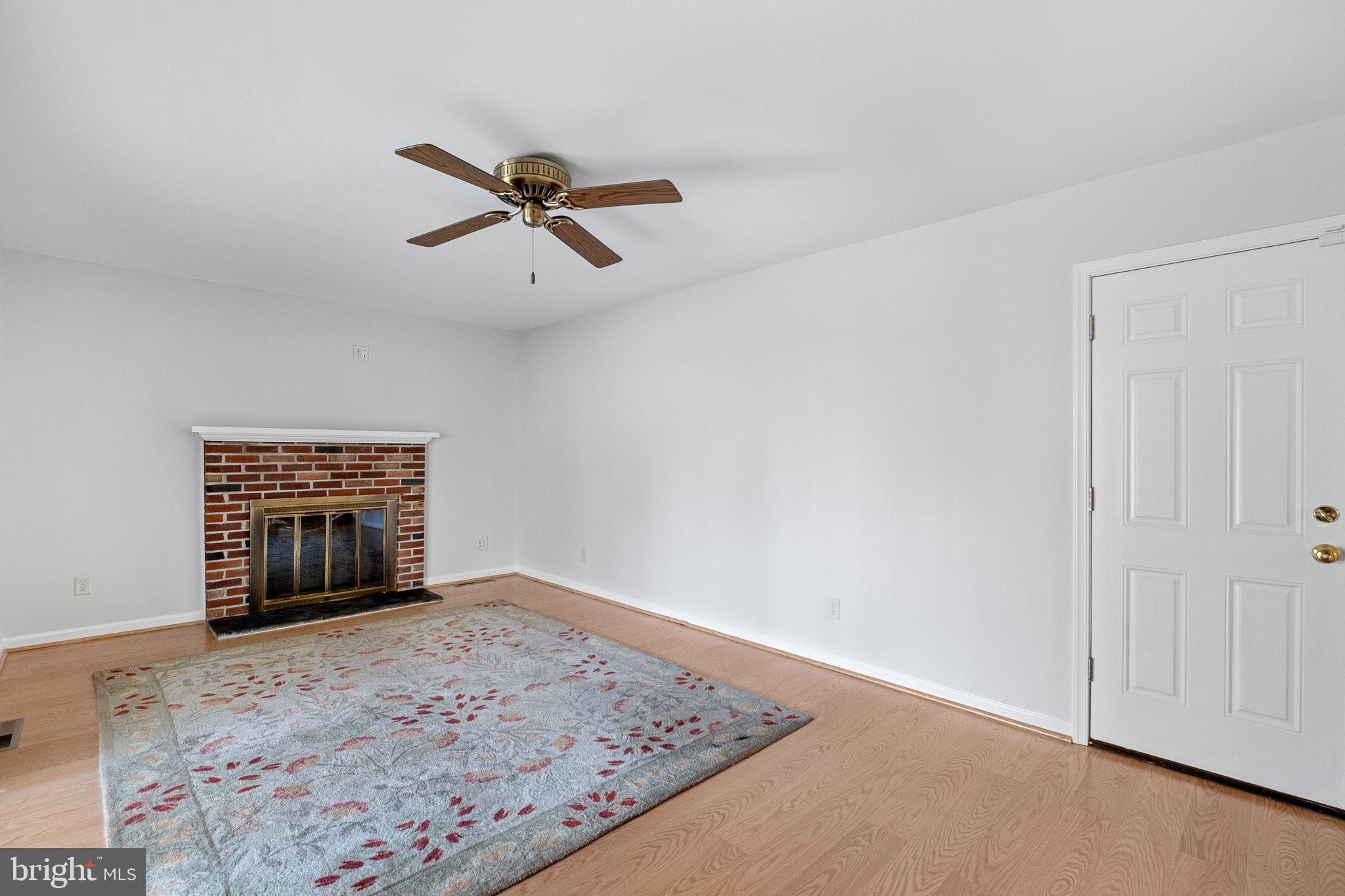 2409 Sweet Briar Road Wilmington, DE 19810 - Photo 10 of 27 Family room with brick fireplace