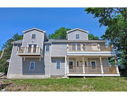 22 East Shore Road Holbrook, MA 02343 - Photo 1 of 27 a front view of a house with a yard
