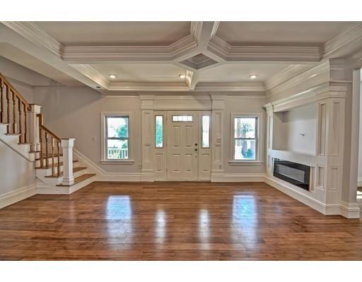 22 East Shore Road Holbrook, MA 02343 - Photo 11 of 27 a view of empty room with wooden floor and fireplace