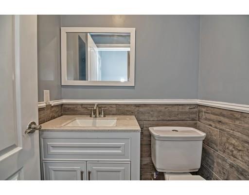22 East Shore Road Holbrook, MA 02343 - Photo 14 of 27 a bathroom with a sink toilet and mirror