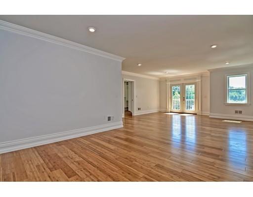 22 East Shore Road Holbrook, MA 02343 - Photo 18 of 27 a view of an empty room with wooden floor and a window