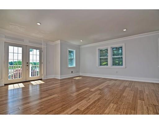 22 East Shore Road Holbrook, MA 02343 - Photo 21 of 27 a view of an empty room with wooden floor and a window