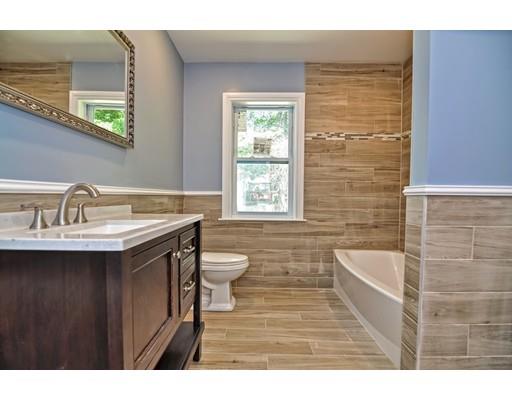 22 East Shore Road Holbrook, MA 02343 - Photo 22 of 27 a bathroom with a sink and a toilet