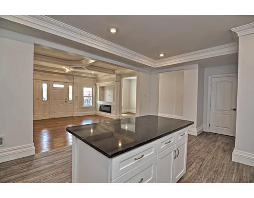 22 East Shore Road Holbrook, MA 02343 - Photo 9 of 27 a kitchen with granite countertop a sink and center island