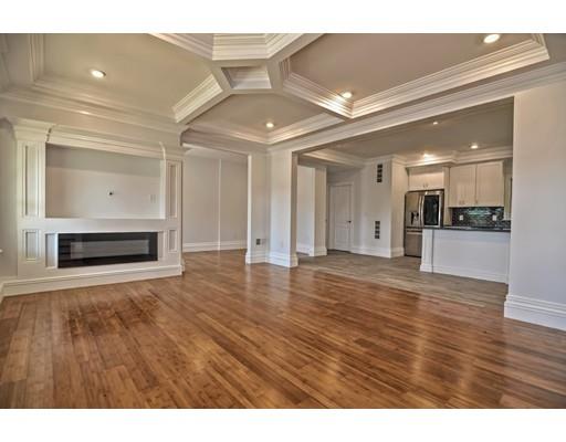 22 East Shore Road Holbrook, MA 02343 - Photo 10 of 27 a view of empty room with wooden floor and fireplace