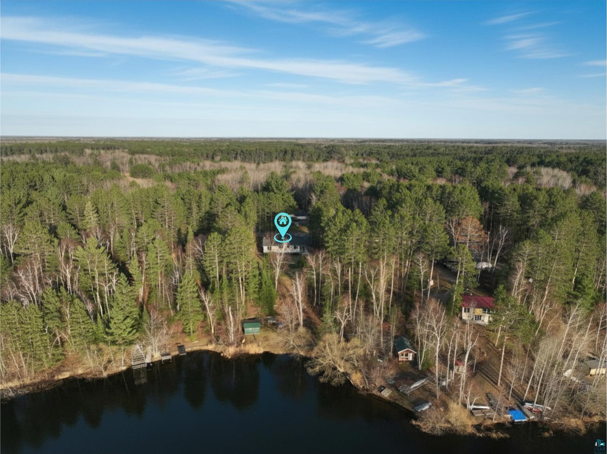 3975 Long Lake Shores Road Eveleth, MN 55734 - Photo 79 of 84 Expansive wooded lot featuring a lakeside property with a private dock