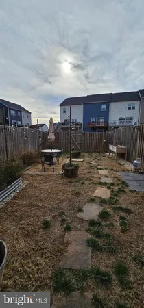 a view of a living room and workspace