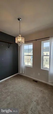 a bathroom with a granite countertop sink toilet and a shower