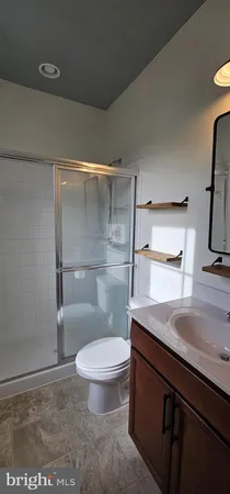 a view of a chandelier in an empty room