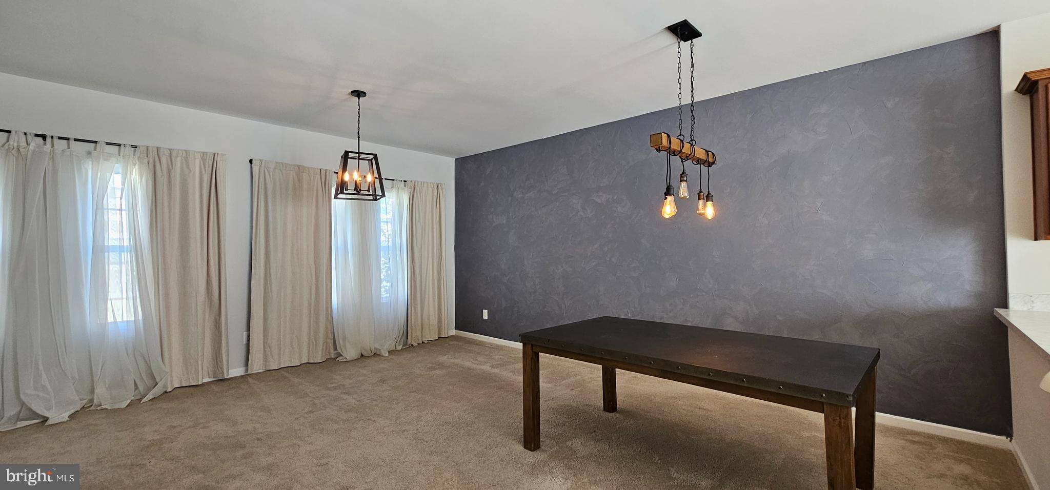 126 Lindy Way Stephenson, VA 22656 - Photo 4 of 22 a view of room with a ceiling fan