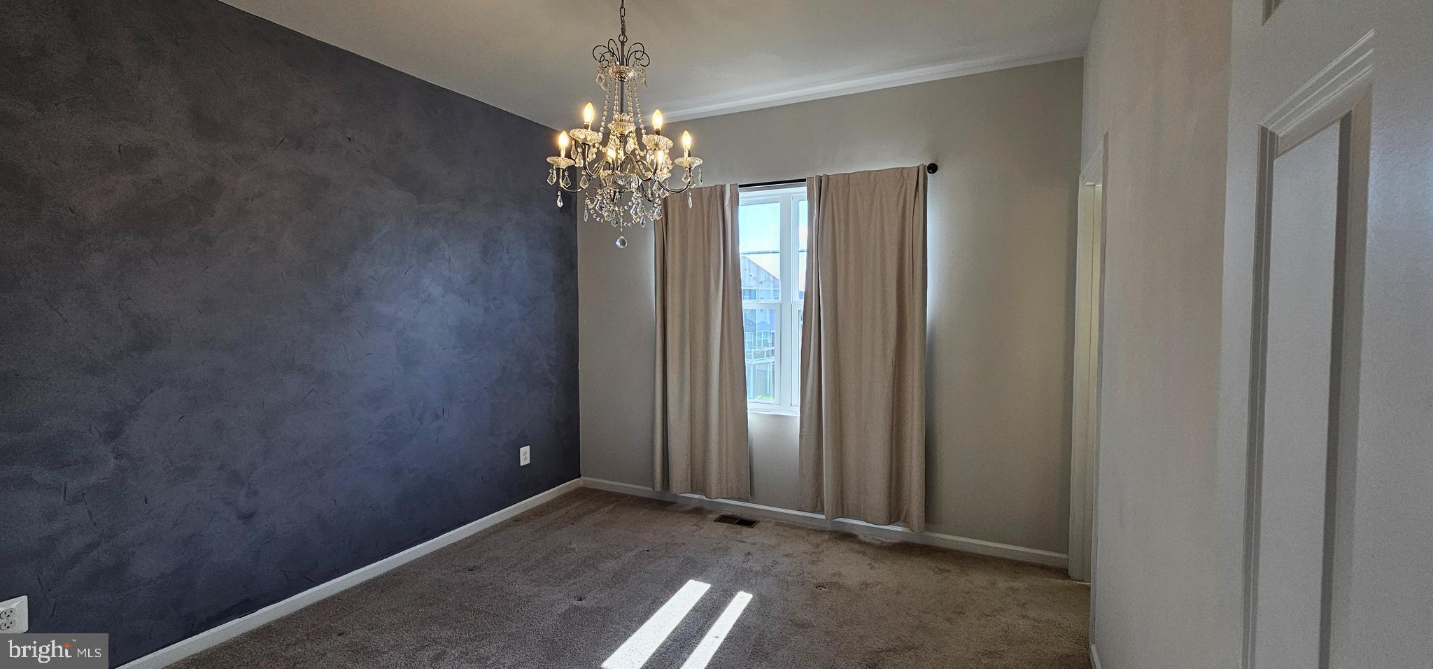 126 Lindy Way Stephenson, VA 22656 - Photo 7 of 22 a view of a chandelier and entryway