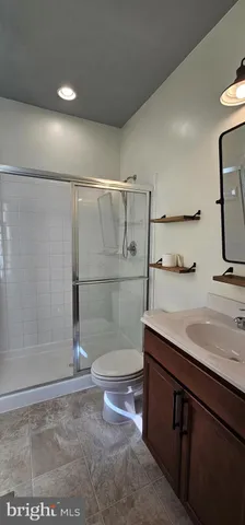 a view of a chandelier in big room